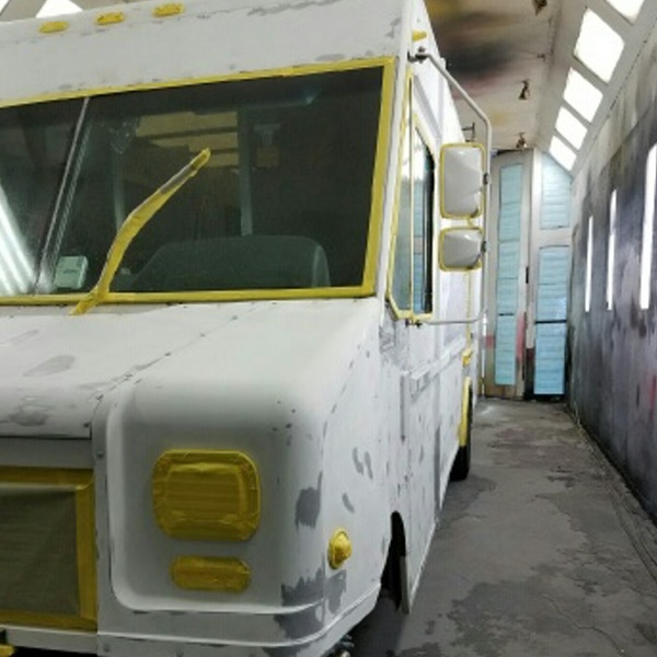 commercial truck painting lt frt in booth