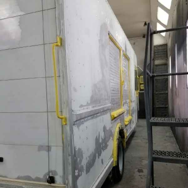 commercial truck painting in booth right rear