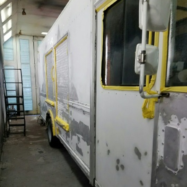 commercial truck painting right side in booth