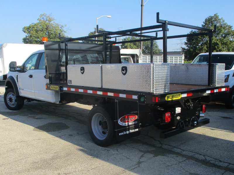 Flatbed with custom ladder rack and toolboxes